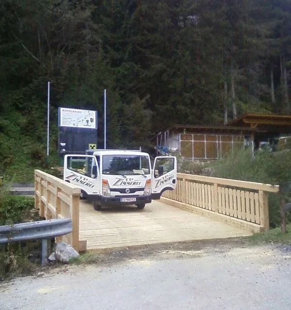 TP Exklusiv Zimmerei GmbH – Brücke aus Massivholt